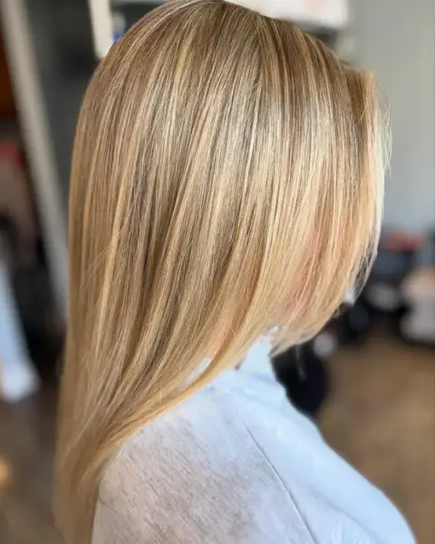 Sun-kissed blonde highlights by Backstage Salon